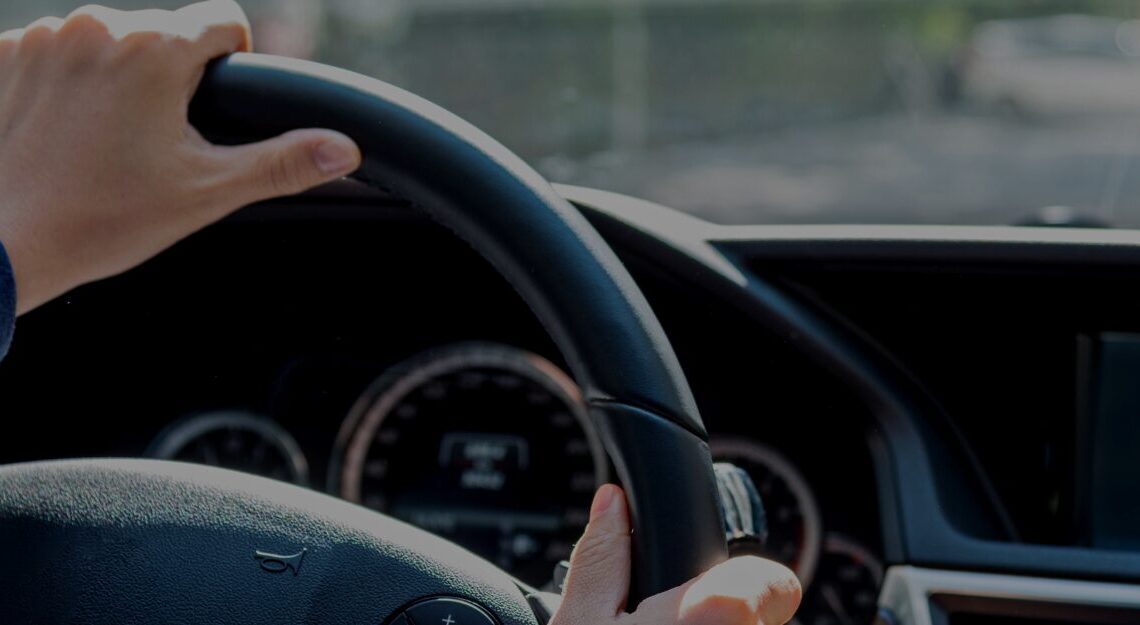 person driving inside the car