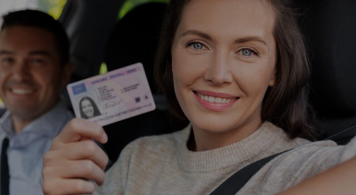 person holding ID outside a car window