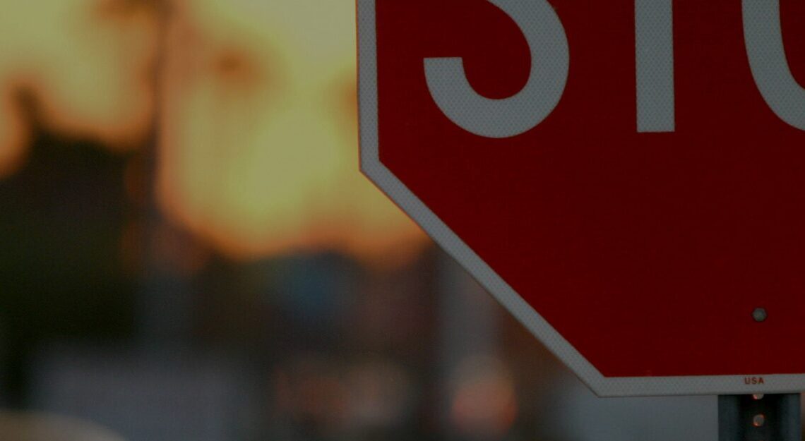 stop sign at dusk
